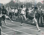 Bridgewater College, John Gohde (photographer), photograph of Danny Metzler and others relay racing, 1974 by John Gohde