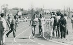 Bridgewater College, Photograph of Ralph Rhodes and Steve Gardner racing, 1976 by Bridgewater College