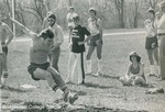 Bridgewater College, Photograph of an athlete landing a jump, 1970s by Bridgewater College