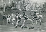 Bridgewater College, Photograph of Alvin Younger, far right, and other men jumping hurdles, 1970s by Bridgewater College