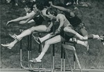 Bridgewater College, Photograph of men on hurdles, 1975 by Bridgewater College