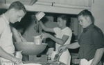 Bridgewater College, Photograph of Jerry Mills, John Rader and John Garber making pancakes for the Varsity Club, probably 1960 by Bridgewater College